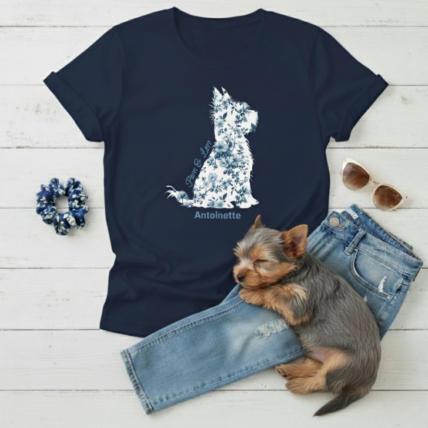 Flat lay of Navy blue Gildan 5000 t-shirt featuring blue Toile de Jouy Yorkshire Terrier silhouette with “Paws & Love” text; personalised Yorkie lover gift for her.