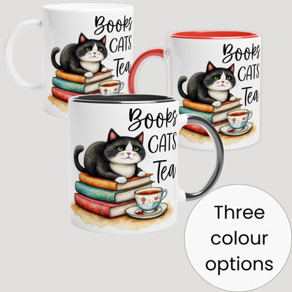 Three mugs with cat illustrations and 'Books Cats Tea' text on a white background. Illustrating that the mugs come in three different colours