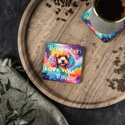 Coaster with a dog illustration and words, "LOVE YOU, 'til you drop." on a wooden tray with coffee.