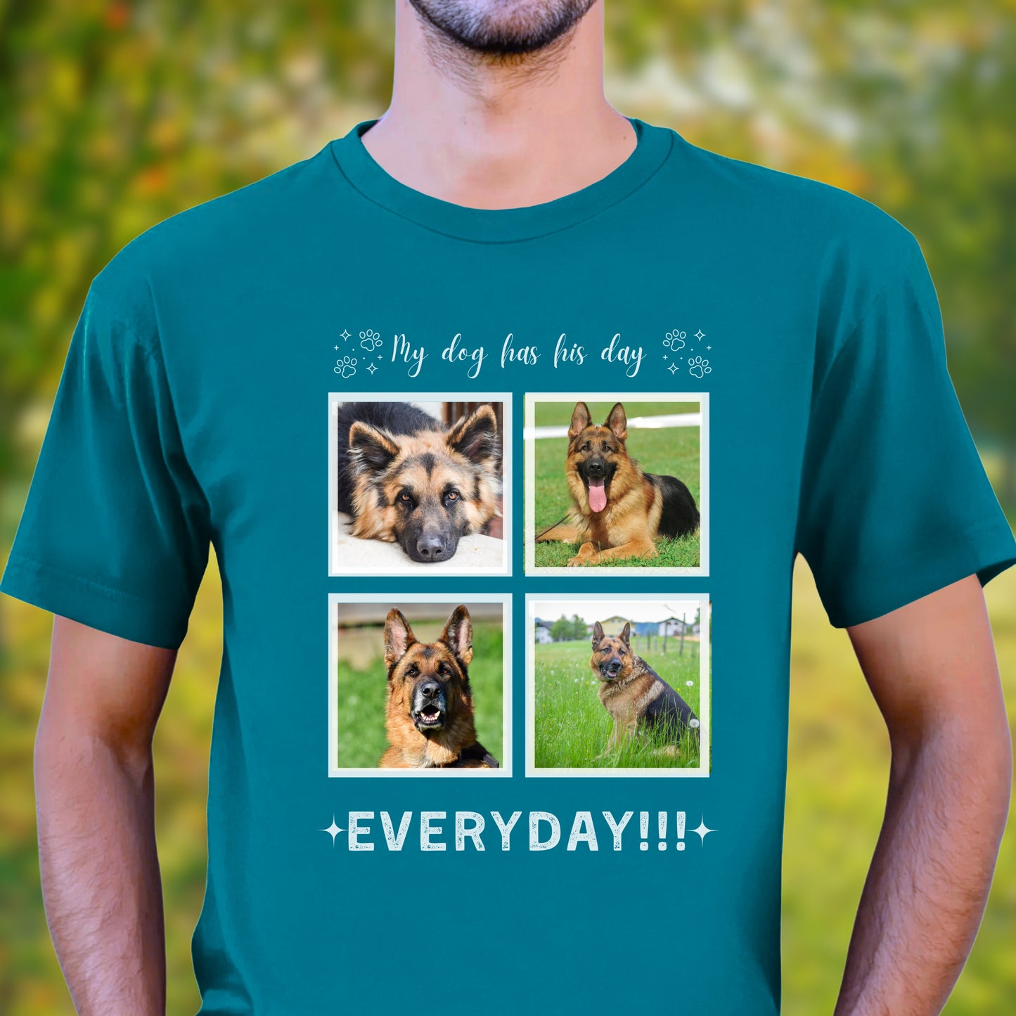 Man standing in a park wearing a teal Custom Dog Photo t-shirt with 4 photos of his German Shepard. The text is 'My Dog Has his Day, everyday!!!'