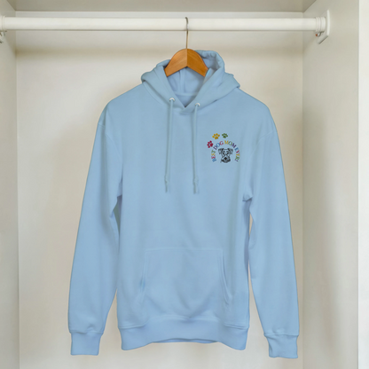 Custom Embroidered Classic Pullover Hoodie | Best Dog Mom Ever! A light blue hoodie hanging in a closet.