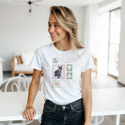 Woman wearing a white trick or treat t-shirt with a retro stamps design, standing in a bright living area.