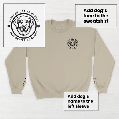 Sand beige sweatshirt with a circular embroidery design reading 'I left my dog to be here' featuring a custom dog's breed and custom name text on a light wooden background.