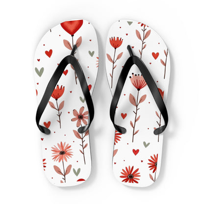 These cushioned Flip Flops have a durable Pink Floral print with hearts. The light weight sandles are shown on a white background. This is the  XL size slip-on sandle.