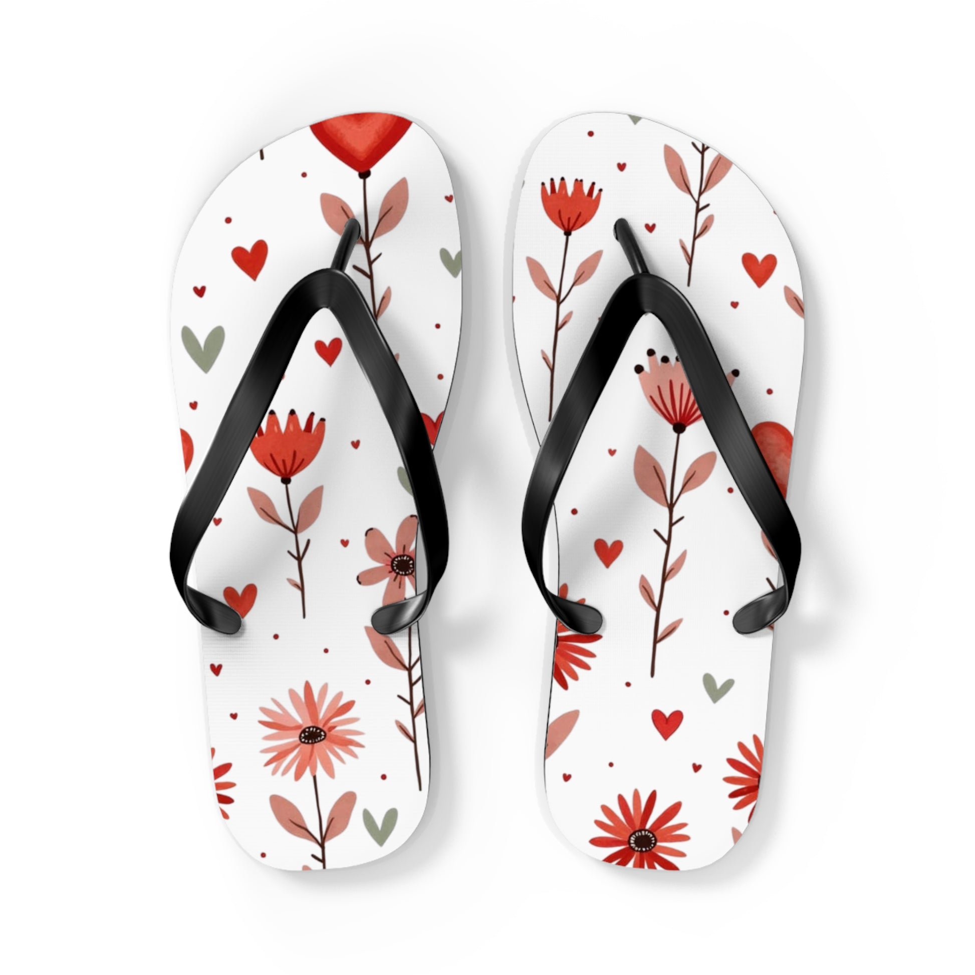 These cushioned Flip Flops have a durable Pink Floral print with hearts. The light weight sandles are shown on a white background. This is the  large size slip-on sandle.