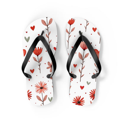 These cushioned Flip Flops have a durable Pink Floral print with hearts. The light weight sandles are shown on a white background. This is the  medium size slip-on sandle.