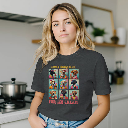 Woman wearing a dark gray t-shirt with a colorful graphic and text in a kitchen.