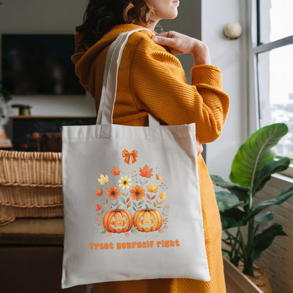 Person wearing a reusable cotton tote bag with an Orange vintage Halloween-themed design and text standing looking out a window.