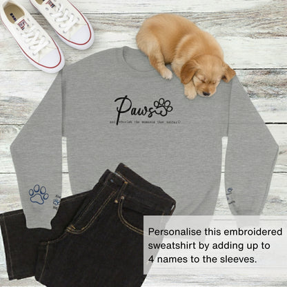 Custom embroidered crew neck pullover sweatshirt in Ash Grey with black jeans, a sneakers, and a cute puppy. 'Paws and cherish the moments that matter.'