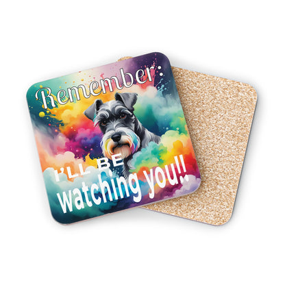 Coaster with a dog illustration and text 'Remember I'll be watching you!' on a colorful background. Second coaster showing the cork underside of coaster.