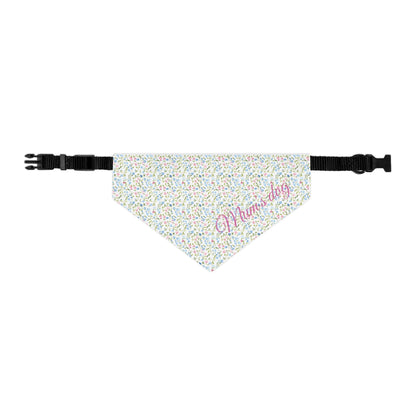 Pink and blue floral patterned dog bandana with 'Mum's dog' text on a white background