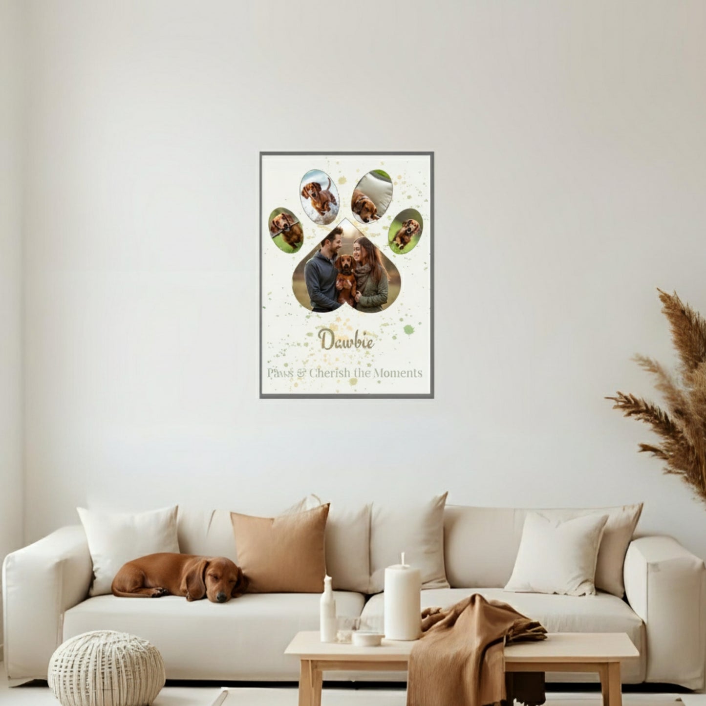 Framed artwork of a dog's life on a wall above a beige sofa with a dog lying on it.