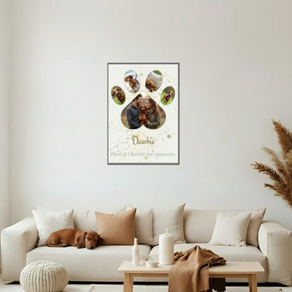 Framed artwork of a dog's life on a wall above a beige sofa with a dog lying on it.