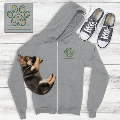 Grey zip hoodie with yellow cottagecore flowers embroidered in a paw print with space for custom pet's name - flat lay with sleeping German Shepard puppy and sneakers