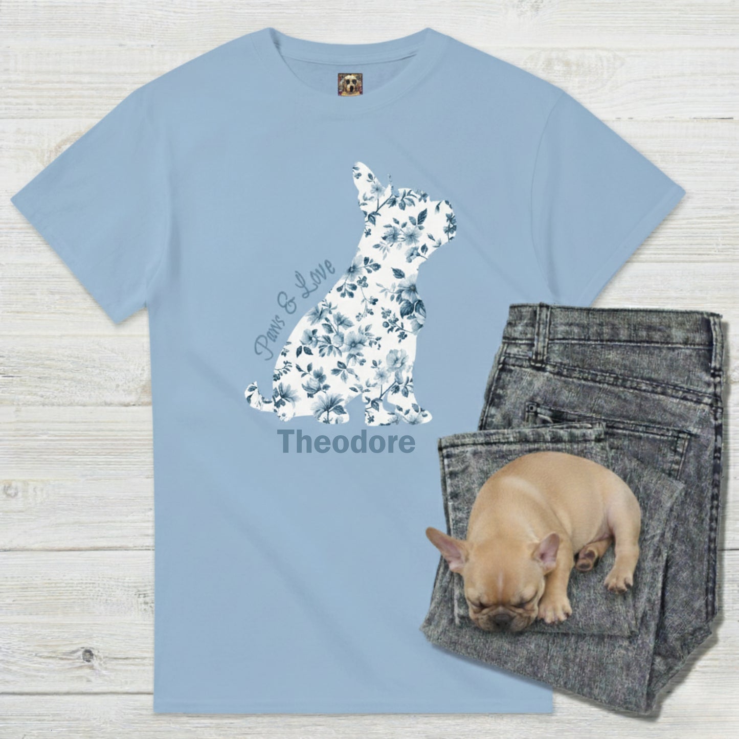 Personalised Frenchie Momma tee, light blue, with jeans and puppy beside floral silhouette print.