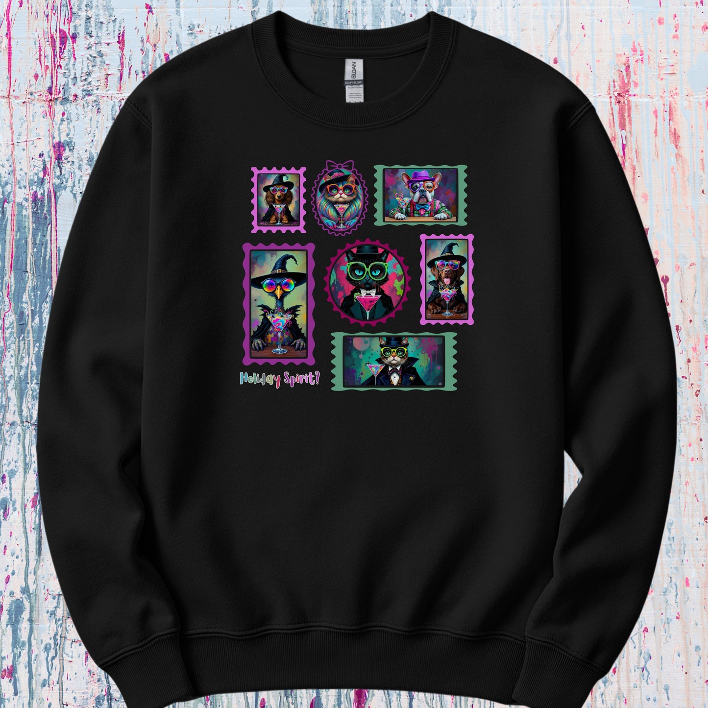 A black sweatshirt with colorful graphic design of witchy cats,  enchanted dogs and a spooky goose in hats drinking colorful cocktails on a flat background