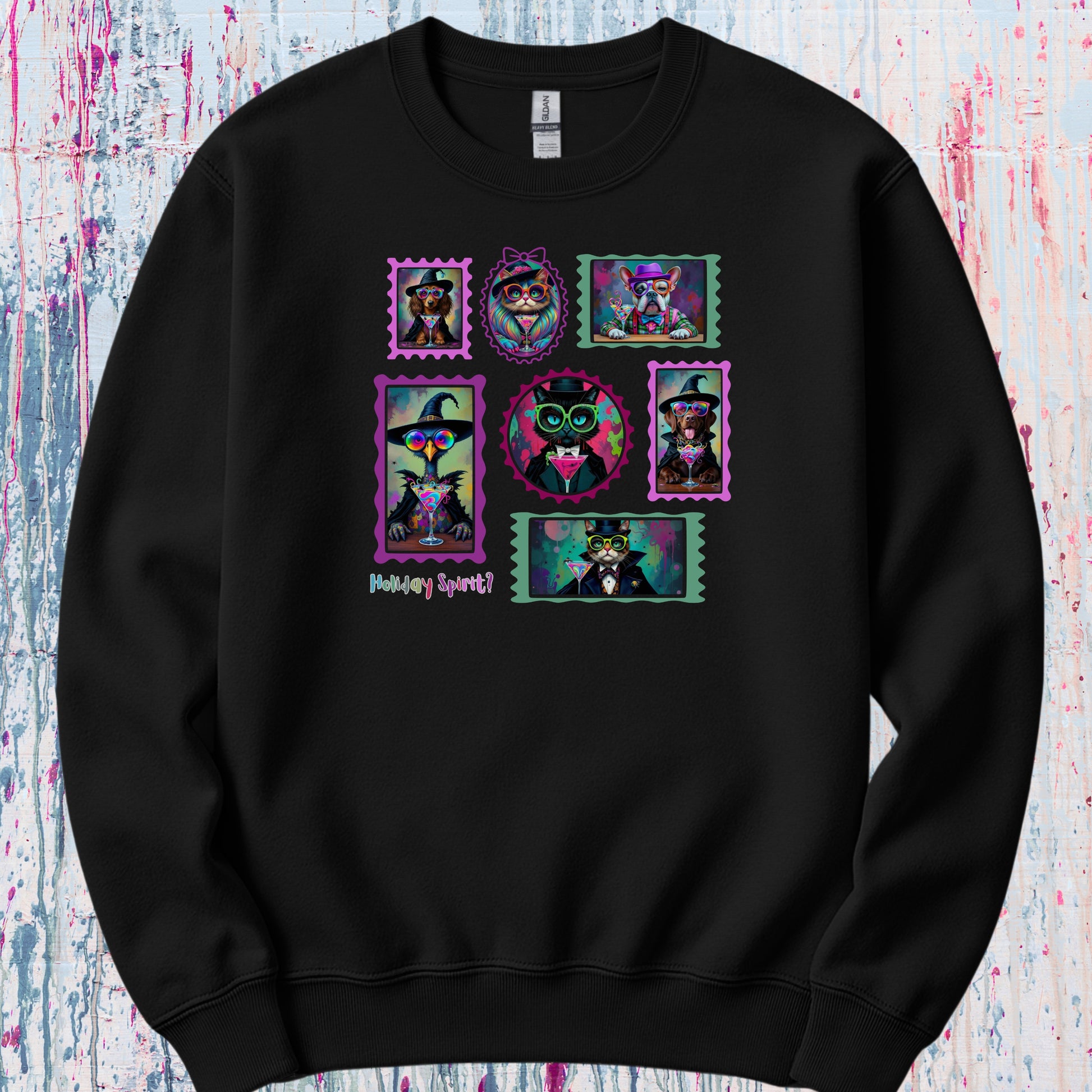 A black sweatshirt with colorful graphic design of witchy cats,  enchanted dogs and a spooky goose in hats drinking colorful cocktails on a flat background