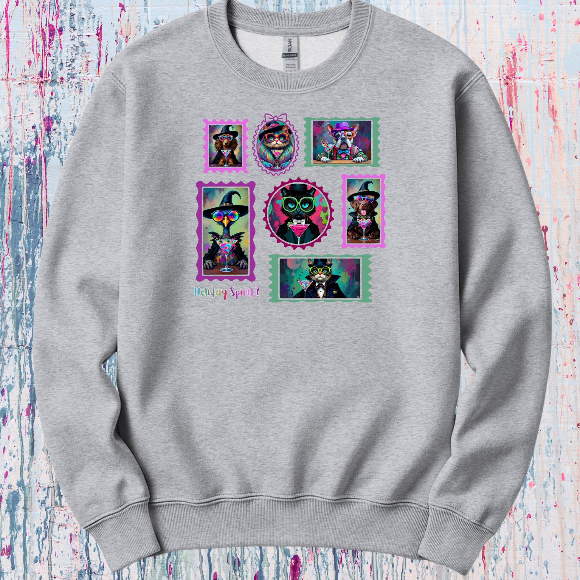 A sport gray sweatshirt with colorful graphic design of witchy cats,  enchanted dogs and a spooky goose in hats drinking colorful cocktails on a flat background