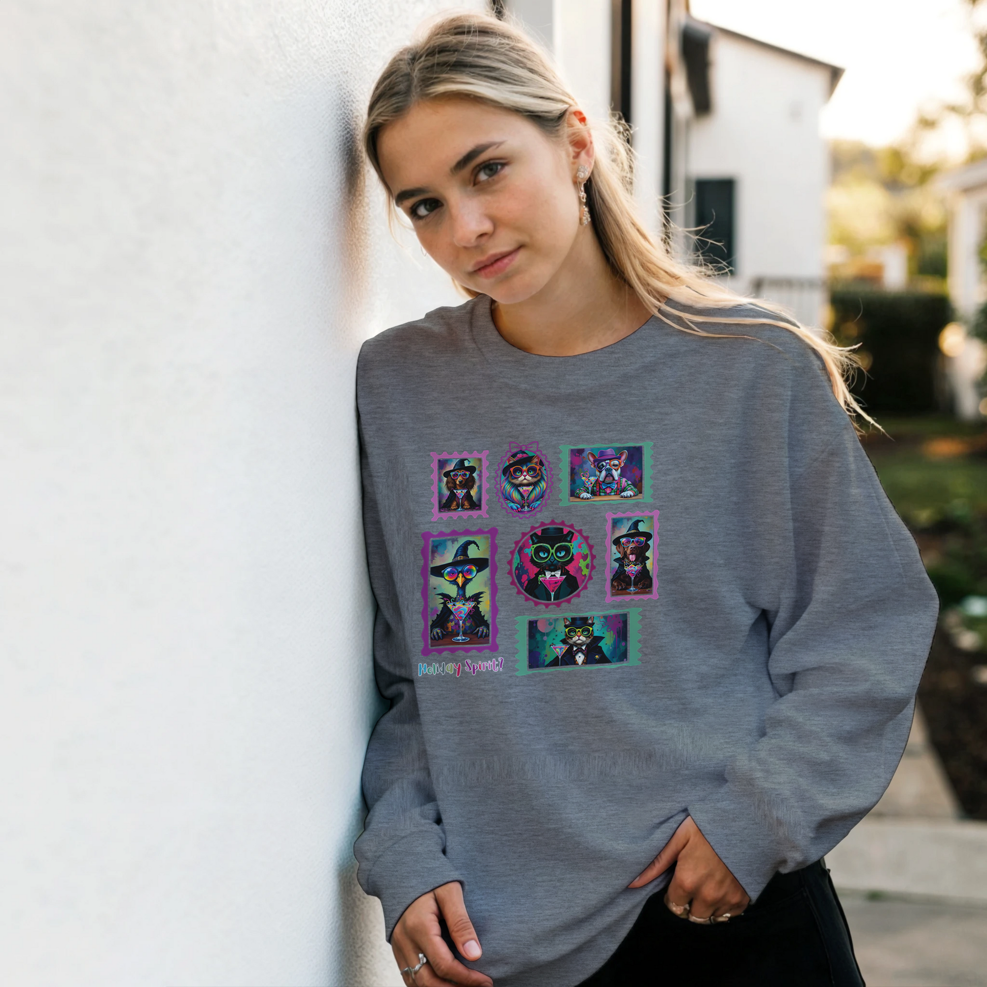 Woman wearing a light grey sweatshirt with Retro Halloween Pets as spooky characters Stamp collage design with outdoor setting.