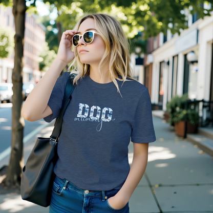 Woman wearing a navy blue t-shirt with 'DOG mom' text on a sidewalk.